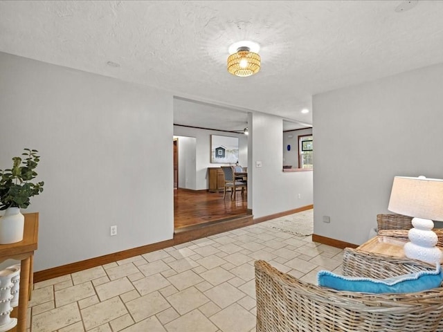 interior space with a textured ceiling