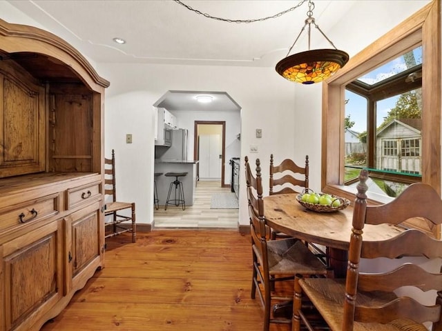 dining room with light hardwood / wood-style floors