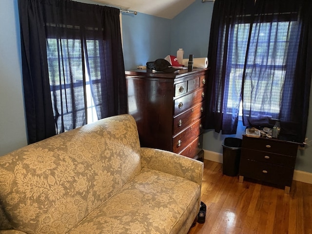 sitting room with hardwood / wood-style floors