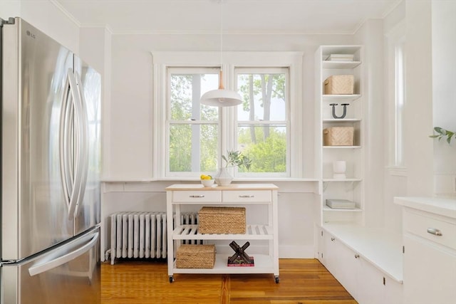 sunroom featuring radiator