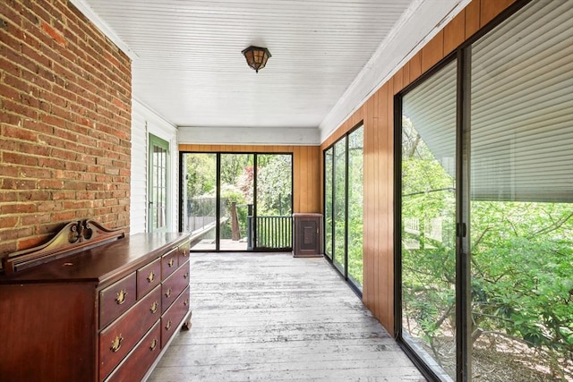 sunroom featuring wood-type flooring