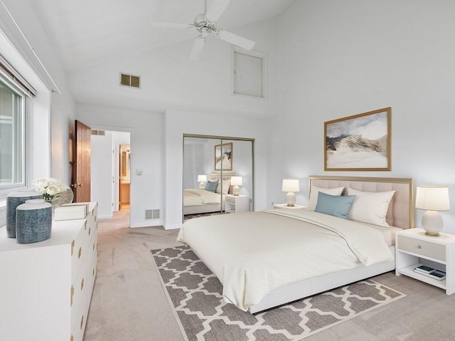 3 Loyalist Dr Unit 3, Uxbridge, MA 01569 - bedroom featuring light colored carpet, high vaulted ceiling, a closet, and a ceiling fan