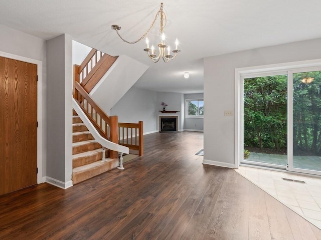 3 Loyalist Dr Unit 3, Uxbridge, MA 01569 - entryway with wood finished floors, stairway, and baseboards