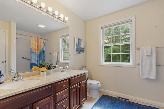31 Fort Pond Hill Rd, Littleton, MA 01460 - bathroom with double vanity, tile patterned floors, and a shower with curtain