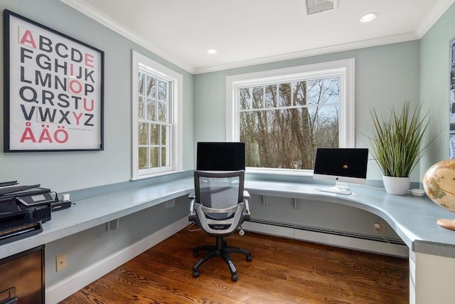 home office featuring visible vents, a healthy amount of sunlight, a baseboard heating unit, and ornamental molding