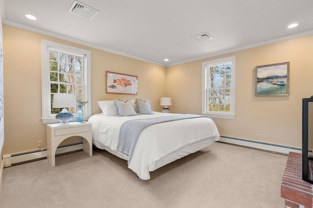 bedroom with a baseboard heating unit, light carpet, visible vents, and ornamental molding