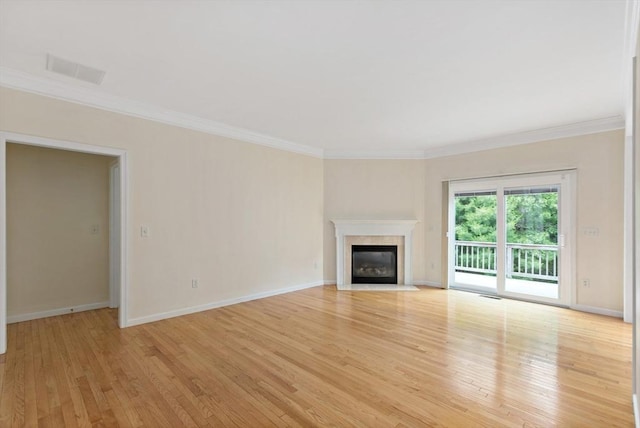 49 Champlain Cir, Plymouth, MA 02360 - unfurnished living room featuring crown molding, light wood-style flooring, and a premium fireplace
