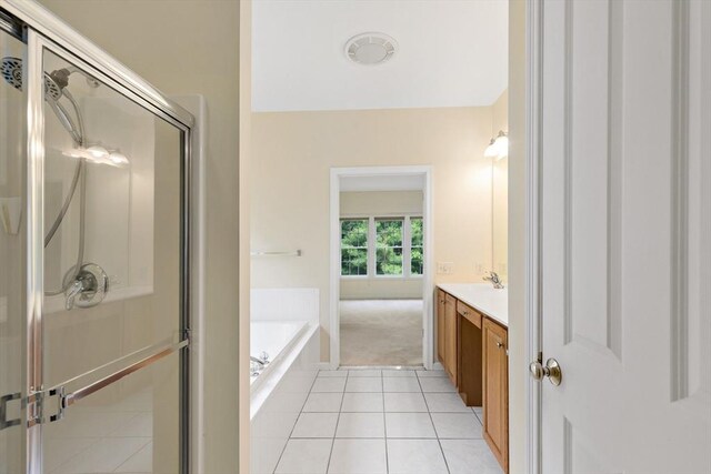 49 Champlain Cir, Plymouth, MA 02360 - full bathroom featuring vanity, a bath, tile patterned floors, and a stall shower