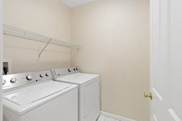 49 Champlain Cir, Plymouth, MA 02360 - washroom with independent washer and dryer and light tile patterned flooring