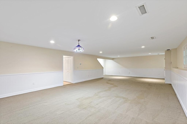 49 Champlain Cir, Plymouth, MA 02360 - interior space featuring light colored carpet, a wainscoted wall, and recessed lighting