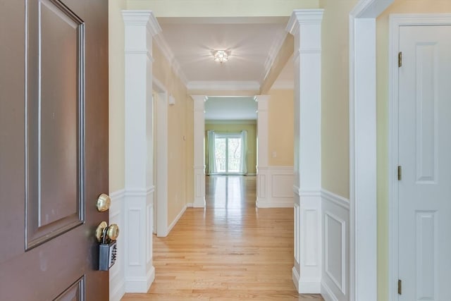 49 Champlain Cir, Plymouth, MA 02360 - corridor featuring ornate columns, ornamental molding, light wood-style floors, a decorative wall, and a wainscoted wall
