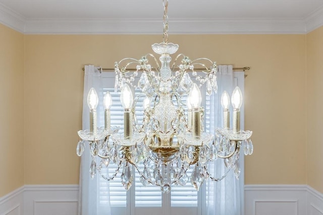 49 Champlain Cir, Plymouth, MA 02360 - detailed view of a chandelier, ornamental molding, a wainscoted wall, and a decorative wall