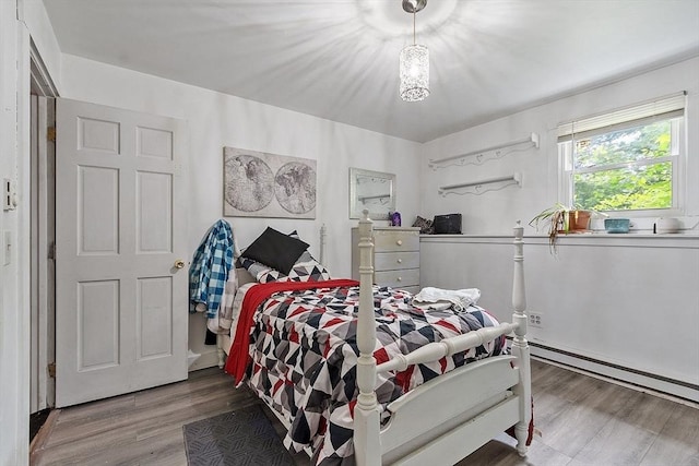 415 Holtshire Rd, Orange, MA 01364 - bedroom with wood finished floors and baseboard heating