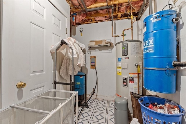 415 Holtshire Rd, Orange, MA 01364 - utilities with water heater and a central vacuum unit
