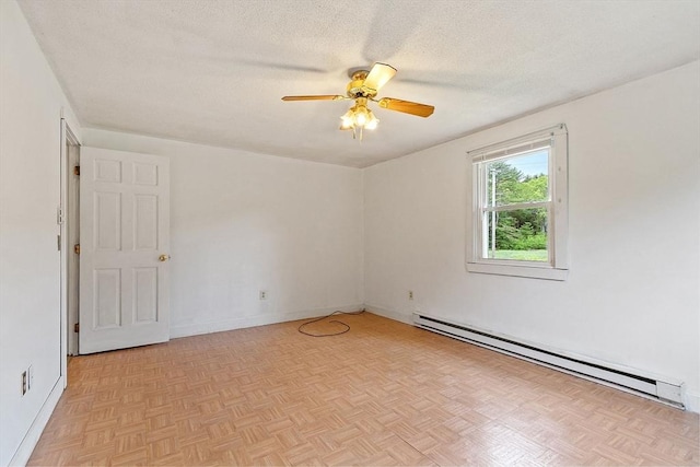 415 Holtshire Rd, Orange, MA 01364 - empty room with a baseboard heating unit, a ceiling fan, a textured ceiling, and baseboards