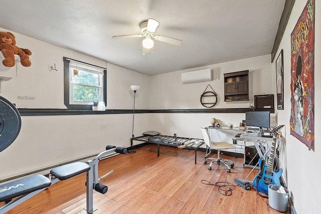 415 Holtshire Rd, Orange, MA 01364 - office space featuring a wall mounted AC, ceiling fan, and wood finished floors