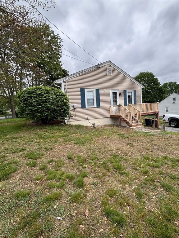 98 Varnum Rd, Dracut, MA 01826 - view of front of home featuring a front yard