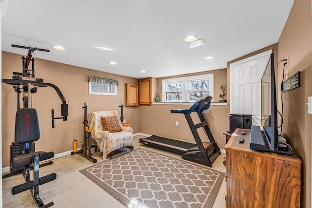 exercise area with recessed lighting and baseboards