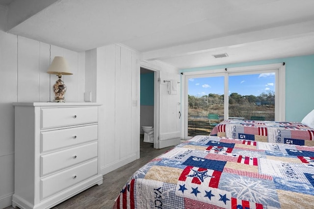 bedroom with access to outside, visible vents, and wood finished floors