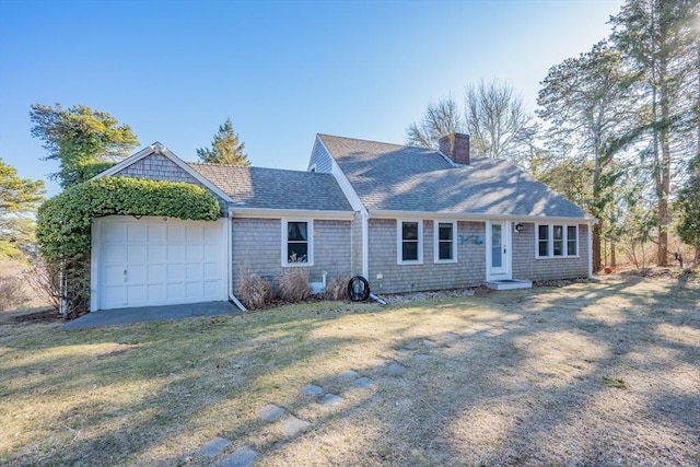 single story home featuring roof with shingles, a chimney, a garage, driveway, and a front lawn