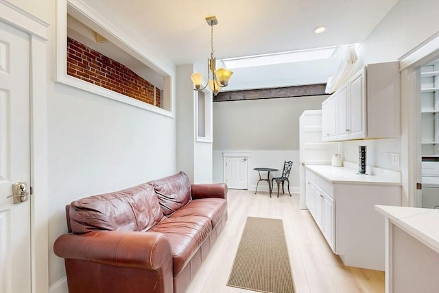 15 Garrison Rd, Brookline, MA 02445 - living room featuring a chandelier, light wood-type flooring, and recessed lighting