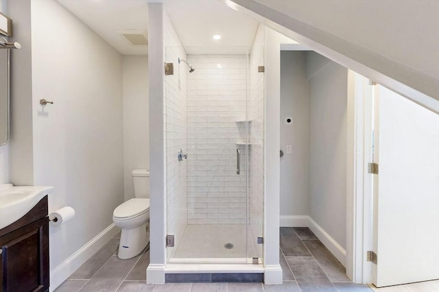 15 Garrison Rd, Brookline, MA 02445 - bathroom featuring vanity, toilet, a stall shower, tile patterned floors, and baseboards