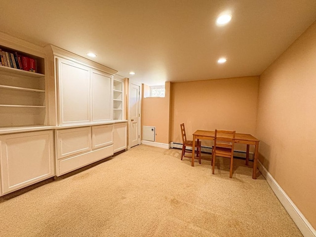 interior space featuring baseboards, recessed lighting, and light colored carpet