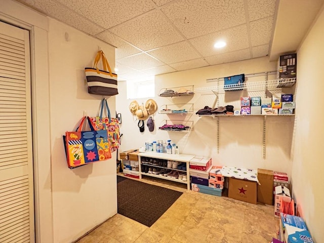 playroom with recessed lighting and a drop ceiling