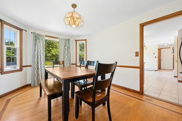 3 Bellingham Rd, Blackstone, MA 01504 - dining space with a chandelier and light wood-type flooring