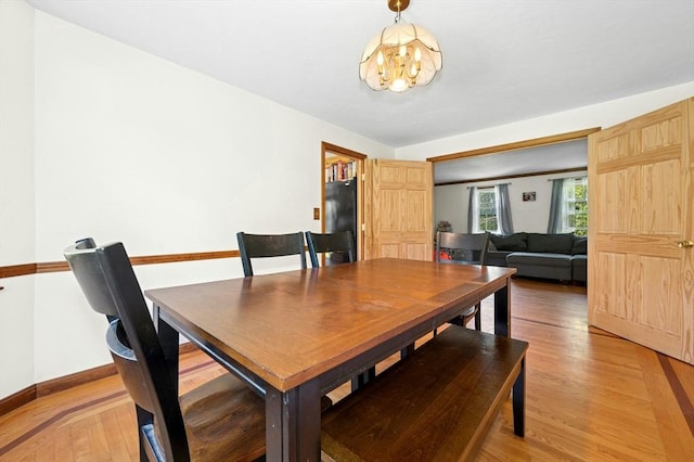 3 Bellingham Rd, Blackstone, MA 01504 - dining area featuring a chandelier and light wood-type flooring