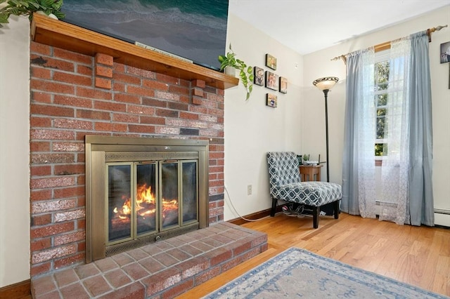 3 Bellingham Rd, Blackstone, MA 01504 - living area with wood finished floors and a fireplace