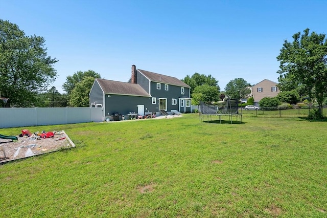 3 Bellingham Rd, Blackstone, MA 01504 - fenced backyard featuring a trampoline