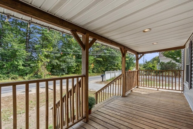 wooden deck featuring covered porch