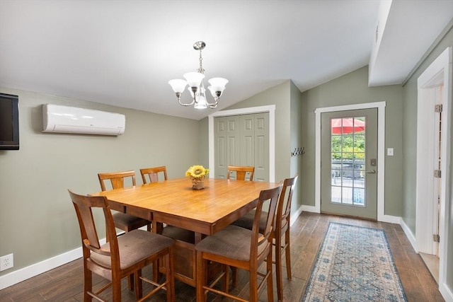 dining space with a wall unit AC, dark hardwood / wood-style floors, vaulted ceiling, and an inviting chandelier