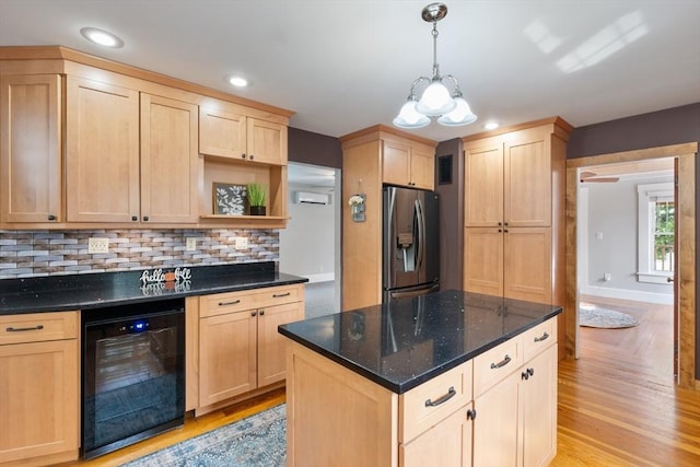 kitchen with backsplash, light brown cabinets, stainless steel refrigerator with ice dispenser, and wine cooler