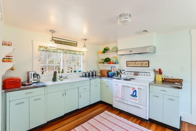 kitchen with dark wood-type flooring, visible vents, electric stove, open shelves, and dark countertops