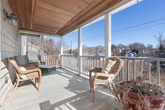 sunroom with wooden ceiling