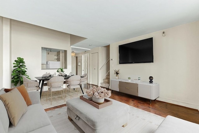 42 8th St Unit 1307, Boston, MA 02129 - living room with stairway, wood finished floors, and baseboards