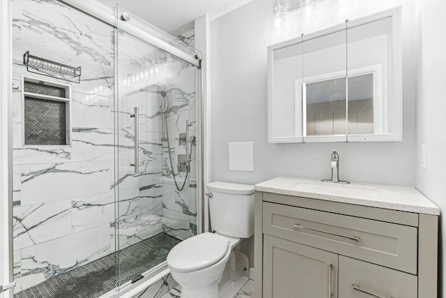 42 8th St Unit 1307, Boston, MA 02129 - bathroom featuring toilet, marble look tile flooring, a marble finish shower, and vanity