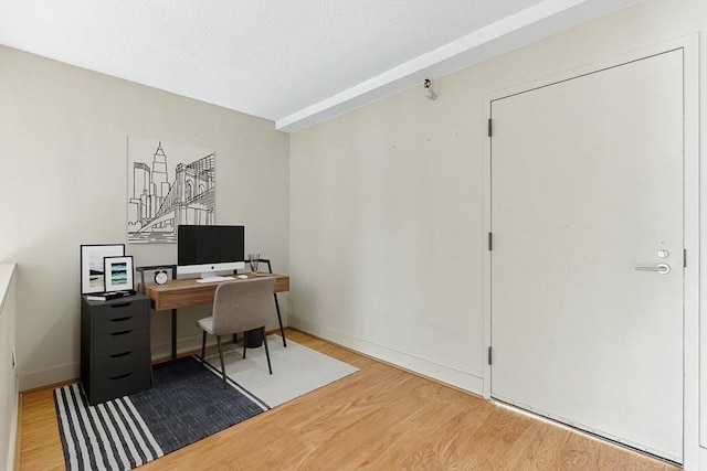 42 8th St Unit 1307, Boston, MA 02129 - office with wood finished floors, baseboards, and a textured ceiling
