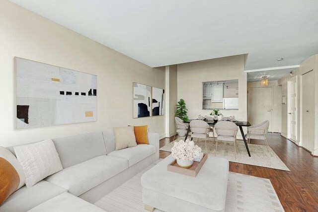 42 8th St Unit 1307, Boston, MA 02129 - living room featuring dark wood-type flooring and baseboards