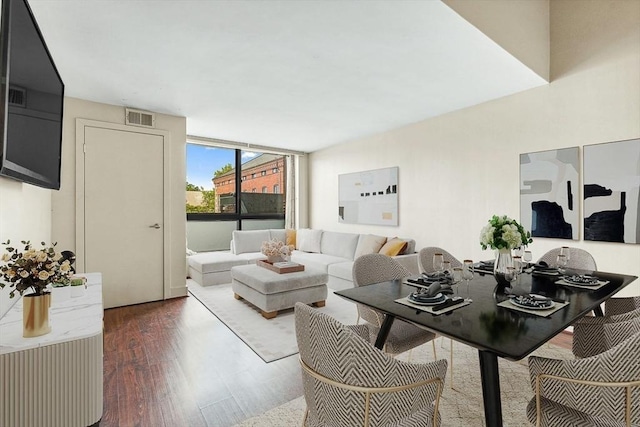 42 8th St Unit 1307, Boston, MA 02129 - living room featuring wood finished floors and a wall of windows
