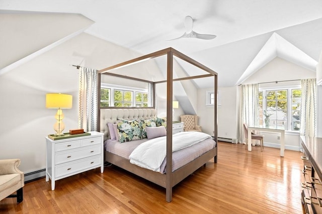 bedroom with a baseboard radiator, lofted ceiling, light wood-style floors, a ceiling fan, and baseboard heating