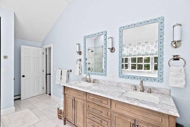 full bathroom with vaulted ceiling, a shower stall, marble finish flooring, double vanity, and baseboards
