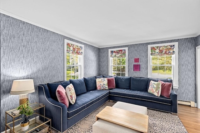 living room featuring a baseboard radiator, crown molding, wood finished floors, and wallpapered walls