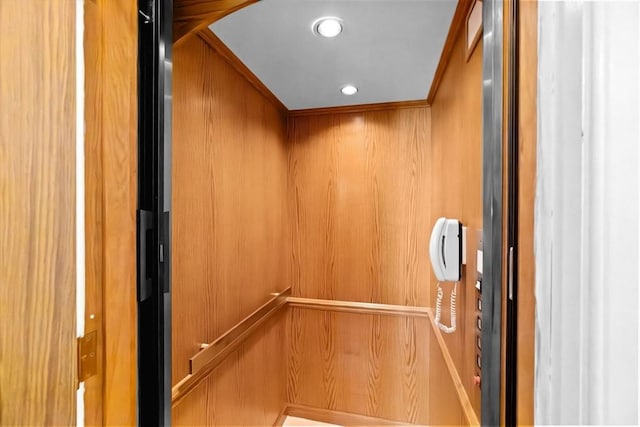 elevator featuring recessed lighting