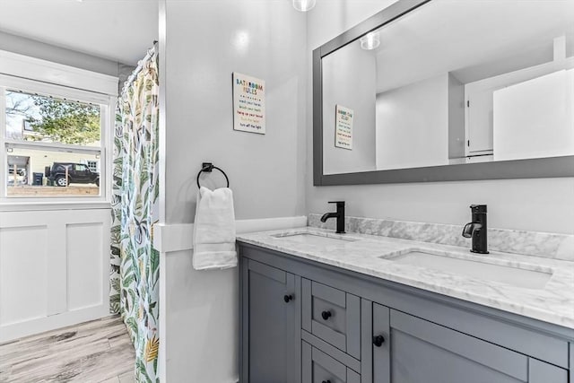 40 Chase Rd, Marlborough, MA 01752 - bathroom with double vanity and wood finished floors
