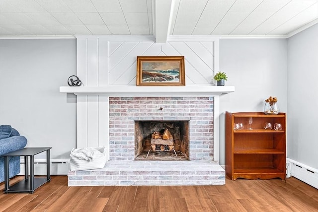 40 Chase Rd, Marlborough, MA 01752 - detailed view of ornamental molding, a brick fireplace, wood finished floors, a baseboard radiator, and a baseboard heating unit