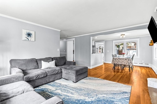 40 Chase Rd, Marlborough, MA 01752 - living room featuring crown molding, wood finished floors, and baseboard heating