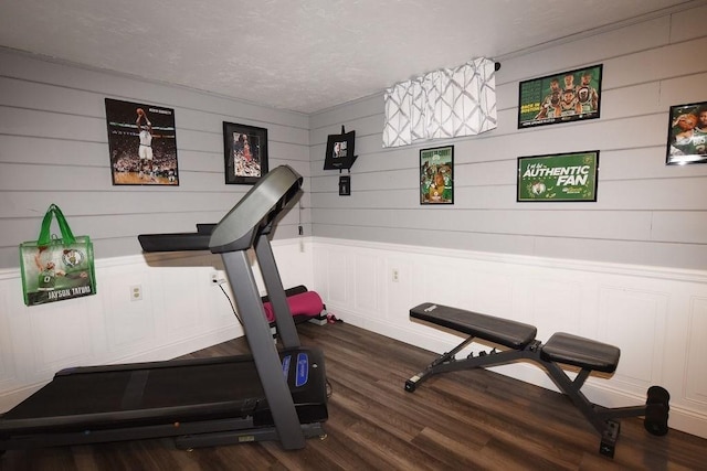 9 Lydon Ln Unit D2, Halifax, MA 02338 - exercise room with dark wood-type flooring and a decorative wall